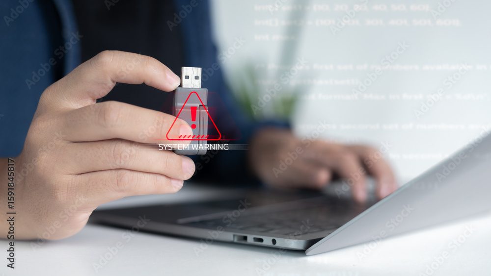 A user comtemplating whether or not to plug in a USB device